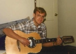 Lenny Gemar playing Ovation Custom Legend 12-string guitar in his Coronado, CA apartment, August, 1980